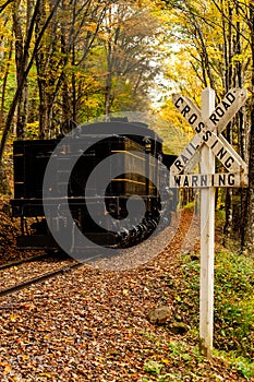Antique Railroad Crossing Sign - Shay Steam Locomotive Climbs Grade in Autumn / Fall - Cass, West Virginia photo