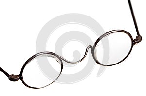 Antique reading glasses isolated