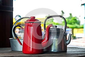 Antique Red Kettle and old aluminium kettle