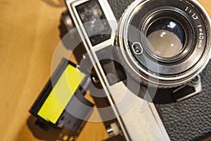 Antique reflex camera with film roll