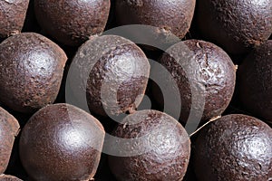 Antique rusty cannon balls, pattern, closeup, ancient iron cannonball.