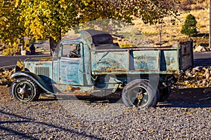 Antique Rusty Dump Truck In Early Morning