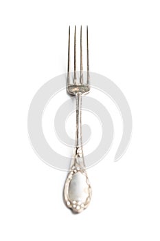 Antique silver fork isolated on white background