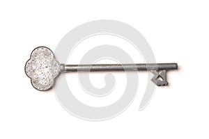 Antique silver key isolated on white background