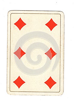 An antique six of diamonds playing card.