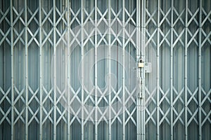 Antique slide steel locked shutter door, texture background