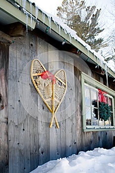 Antique Snowshoes on a Weathered Wood Barn Wall