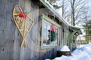 Antique Snowshoes on a Weathered Wood Barn Wall