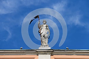 Antique statue on facade of Governor Palace in Piacenza