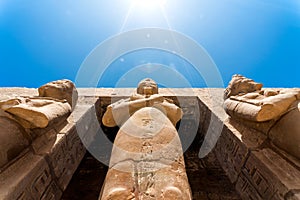 Antique statue in the pillared hall in Luxor in Egypt