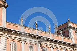 Antique statues on facade of Governor Palace in Piacenza