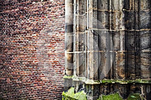 Antique stone column of old church wall as texture close-up. Photo Background