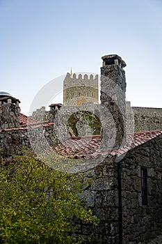 Antique stone houses and Sortelha castle, in Portugal