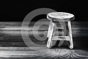 Antique Stool presented on a old Table