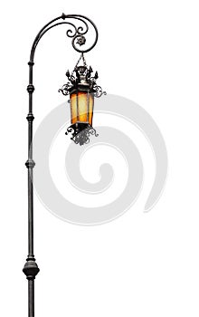 Antique street glass lantern on stand, isolated on white background