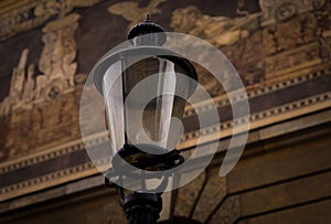 Antique street lamp in Poznan.