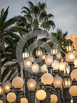 Antique Street Lamps Illuminate Los Angeles At Dusk photo