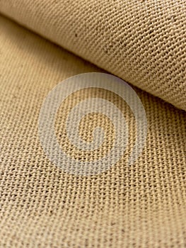 Antique style canvas texture folded fabric background