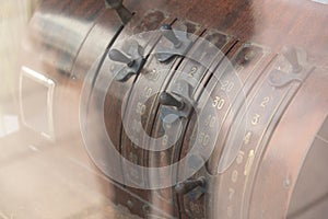 Antique style cash register. Old-time cash register in shop. Vintage mechanical cash register system Telegraph machine