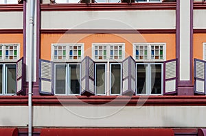 Antique style colorful shophouse windows photo