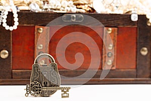 An Antique Style Lock and a Treasure Chest FIlled with Gold and DIamond Treasures