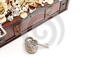 An Antique Style Lock and a Treasure Chest FIlled with Gold and DIamond Treasures