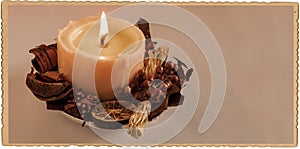 Antique style postcard with burning candle