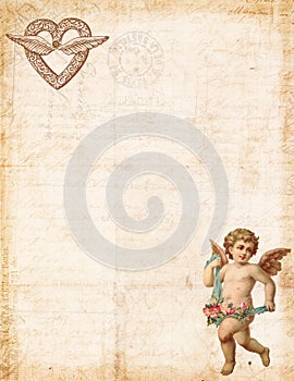 Antique style valentine`s stationary featuring cupid and heart photo