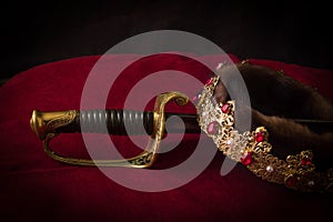 Antique sword and golden crown