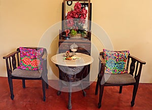 Antique table and chairs in the living room.