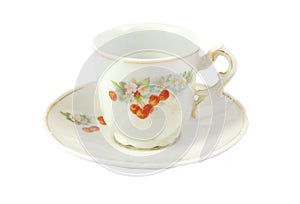 Antique tea cup isolated on a white background