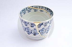 Antique tea cup restored with gold 22k. Kintsugi technique.