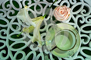 Antique tea cup on the table with cupcake background,Top View
