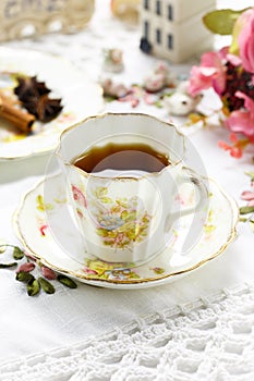 Antique tea cup on the table