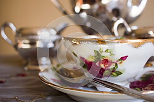 Antique teacup and silver tea set