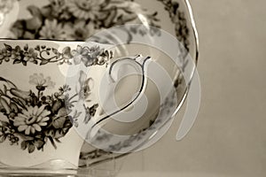 Antique teacup on white