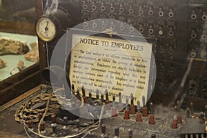 Antique telephone switch with sign