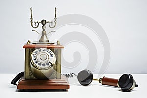Antique telephone on white background