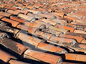 Antique tiled clay pavement on the roof of the building