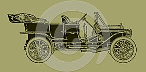 Antique touring car in side view