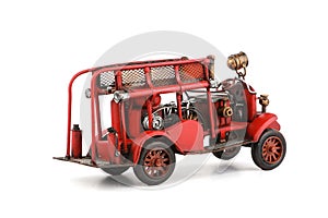 Antique Toy Fire Engine on white background, isolated