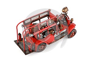 Antique Toy Fire Engine on white background, isolated