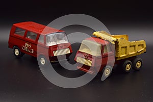 Antique Toy Trucks on Black