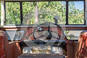 Antique tractor cab with steering wheel