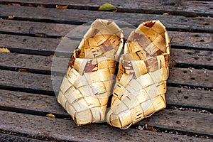 Antique traditional Russian shoes made of birch bark