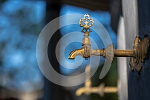 Antique Turkish faucet on wall