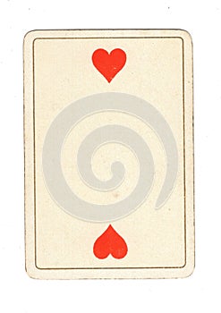 An antique two of hearts playing card.