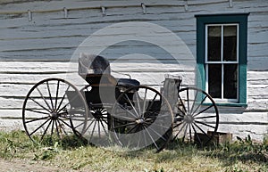 Antique Two Seater Horse Drawn Buggy photo