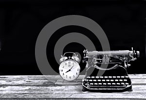 Antique Typerwriter and Alarm Clock