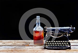 Antique Typerwriter and Whisky Bottle.